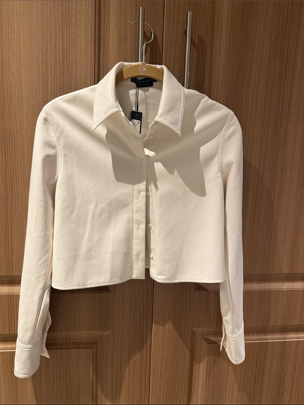 Alice + Olivia Cropped Button-Down Faux Leather Shirt in Cream